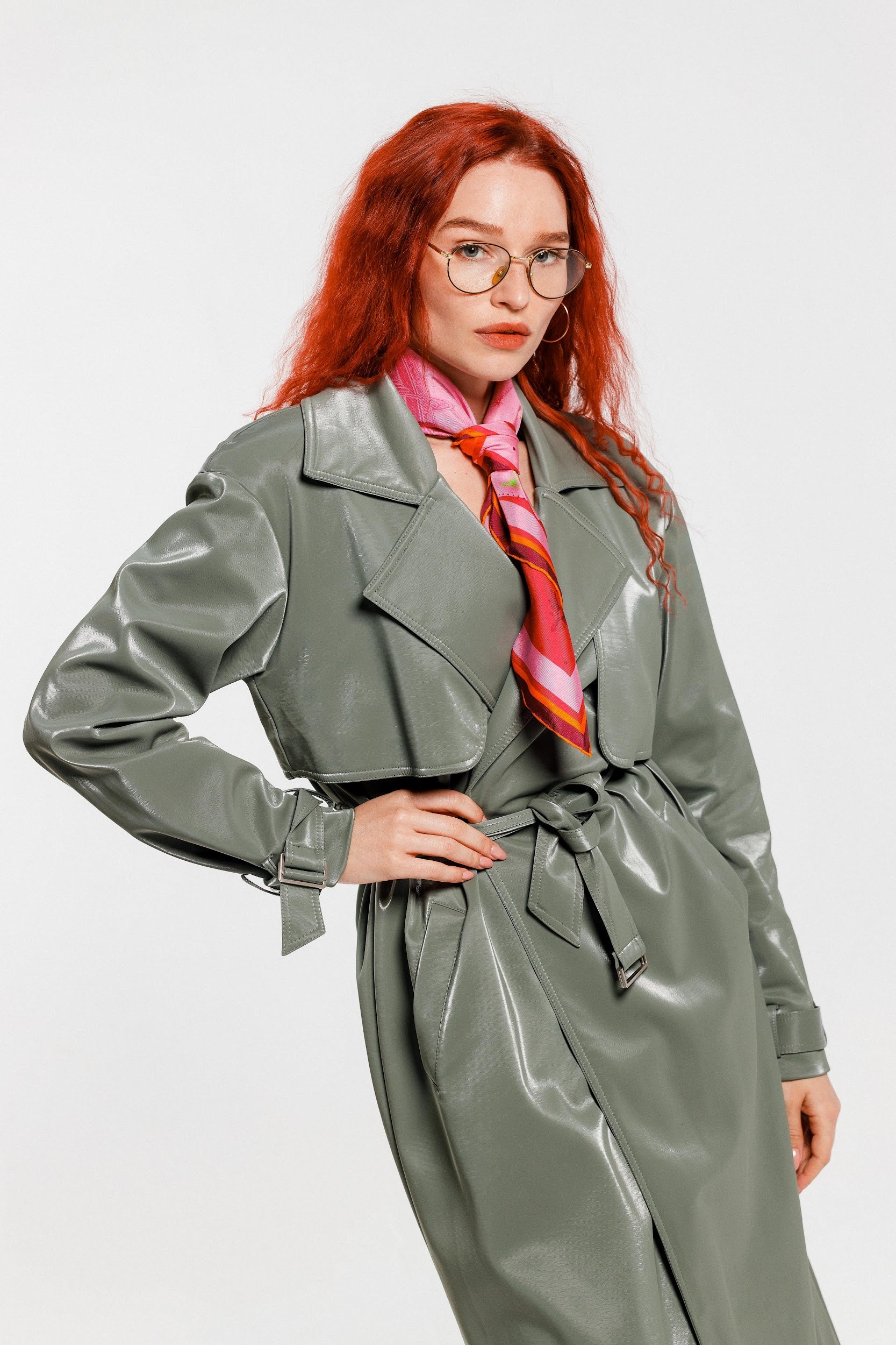 Model wearing pink silk twill square scarf around neck as tie