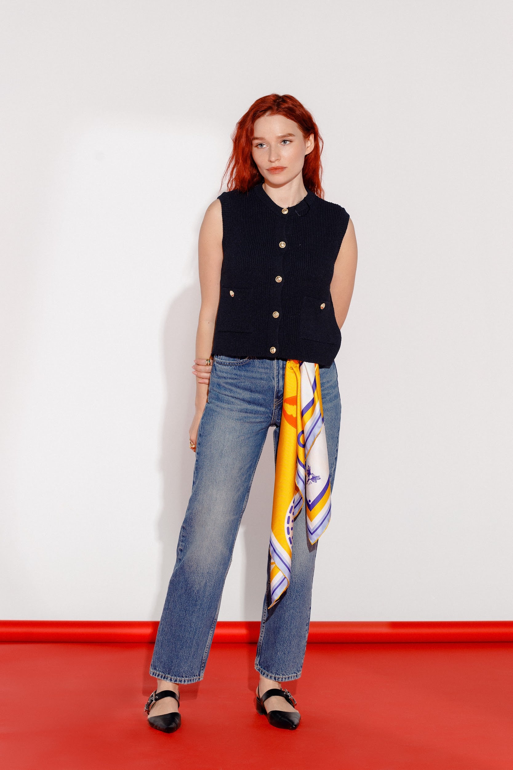 Model wearing silk twill square scarf around belt