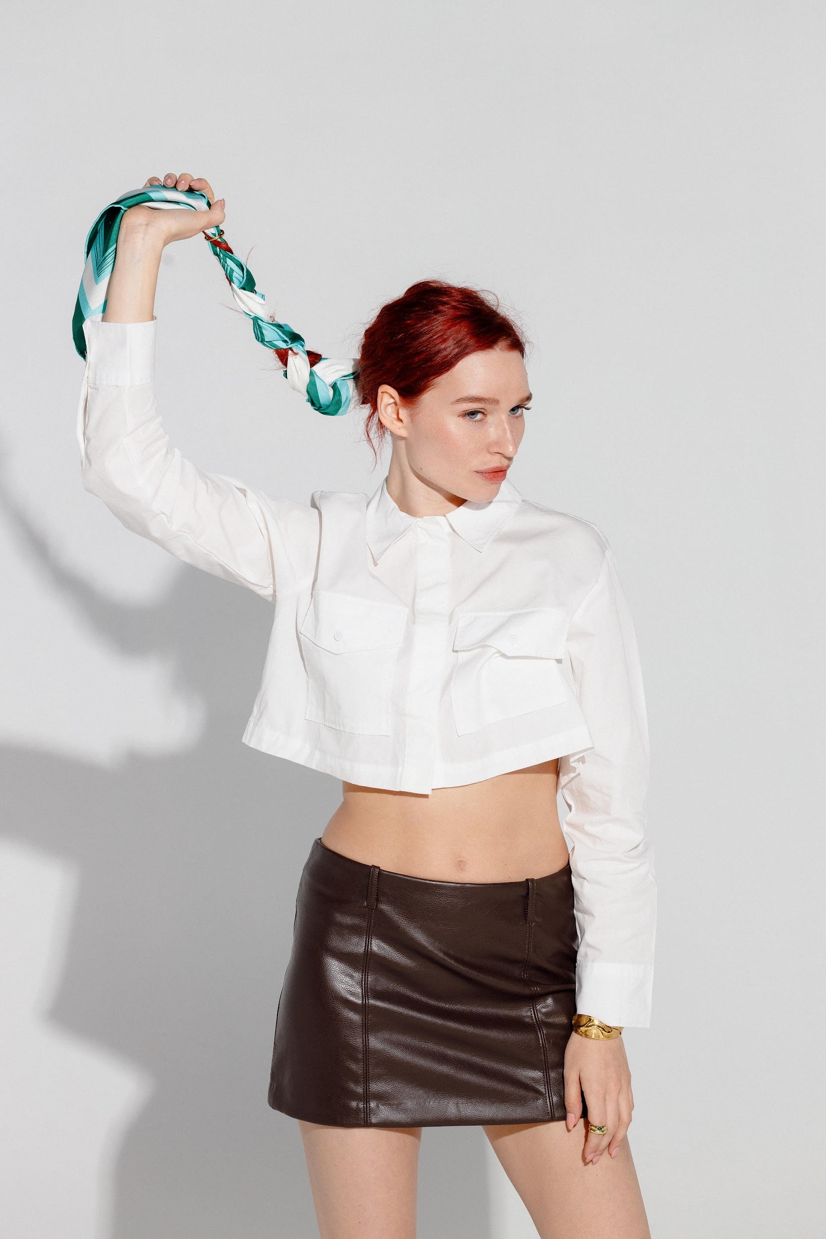 Model wearing white and blue silk twill square scarf on braid