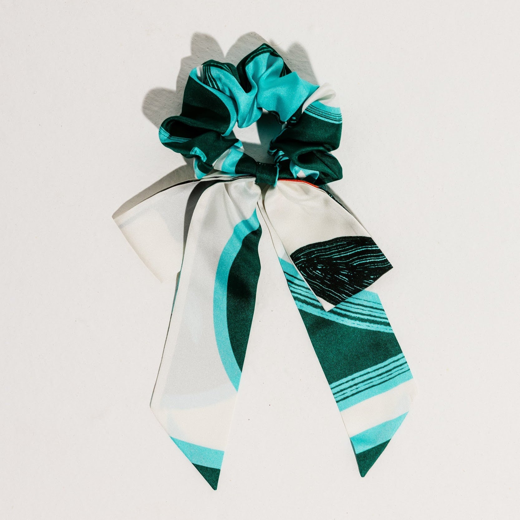 Silk scrunchie with bow in white green and blue print
