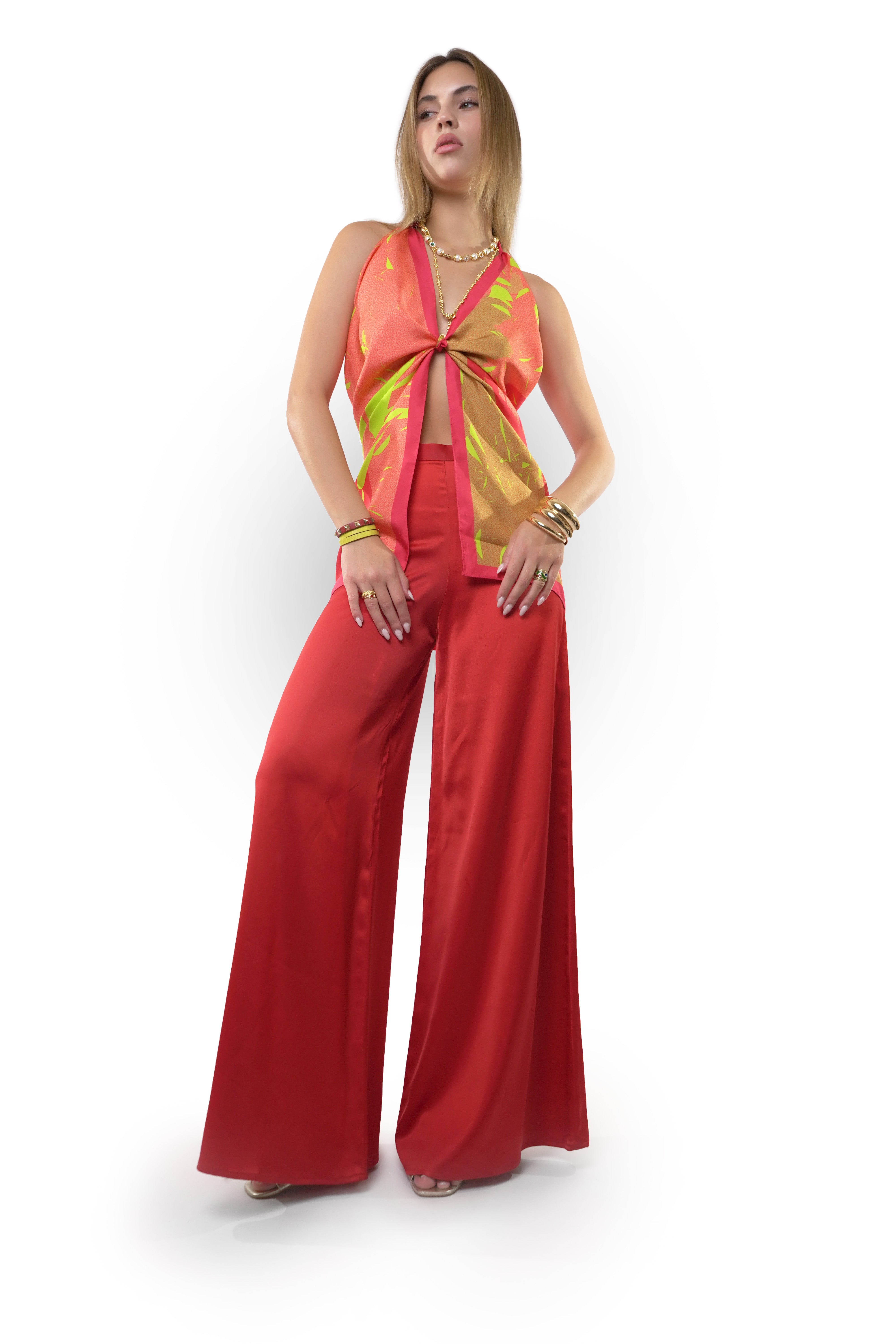 model wearing red and pink silk twill square scarf as top