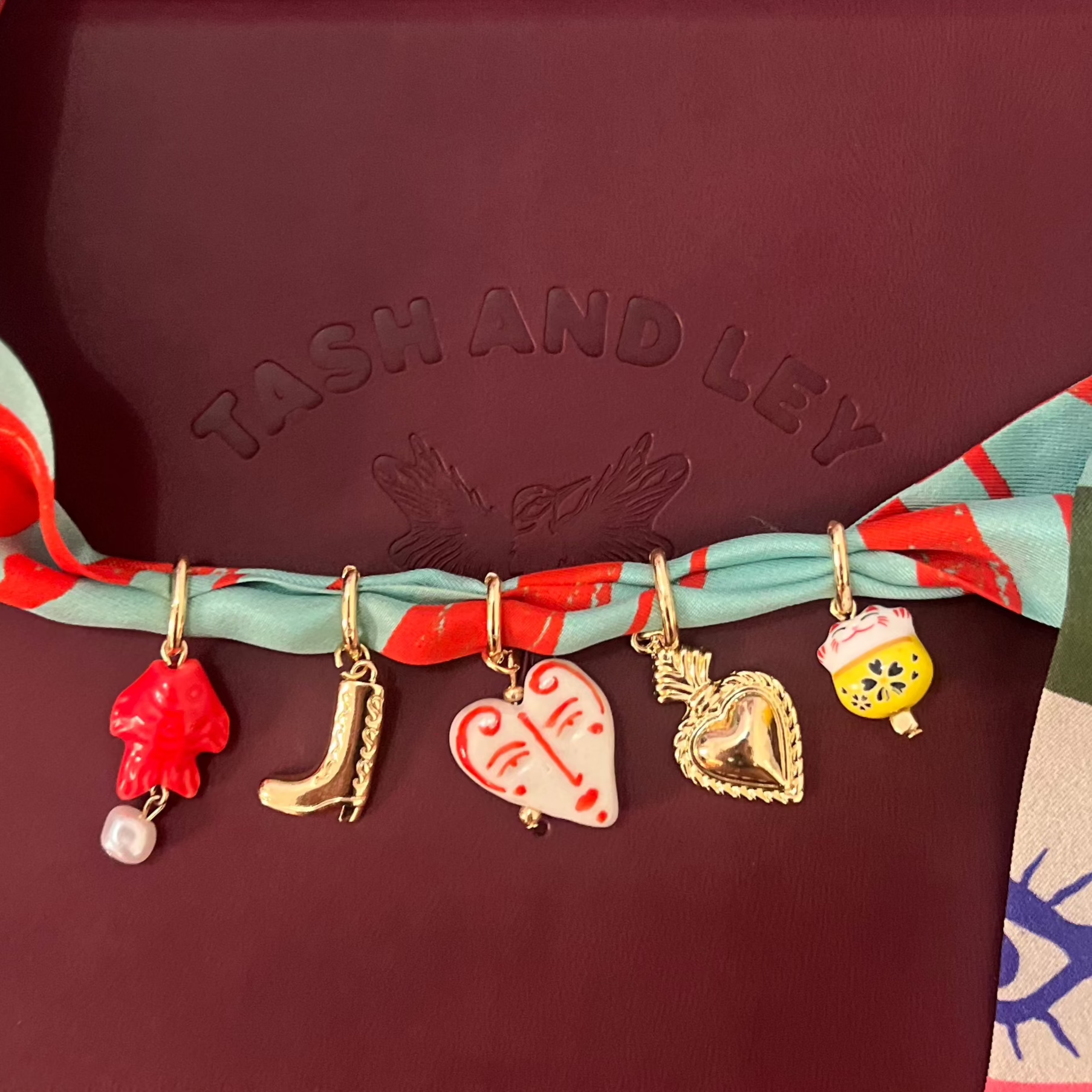 necklace made from silk fabric and charms