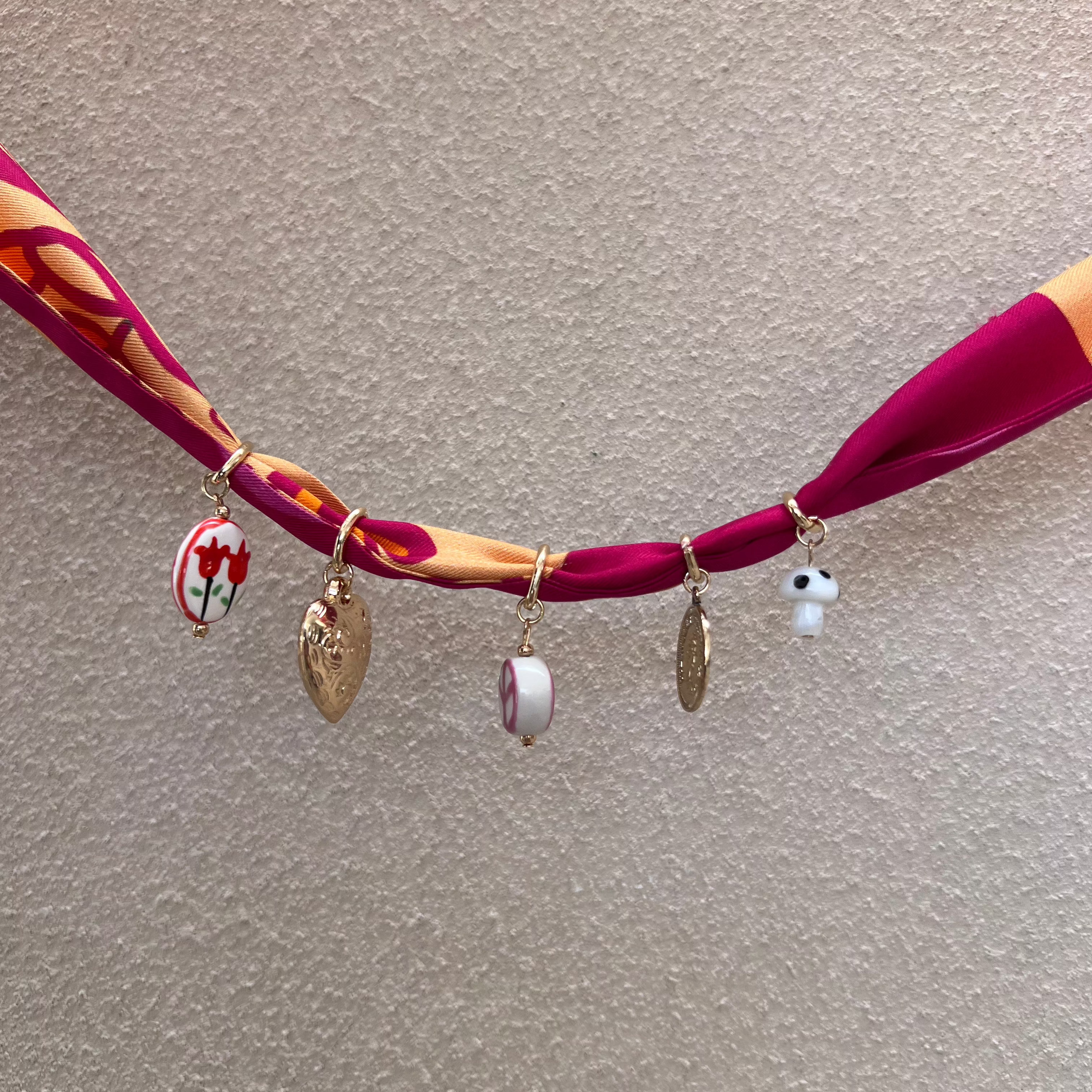 adjustable charm necklace made from silk fabric and charms