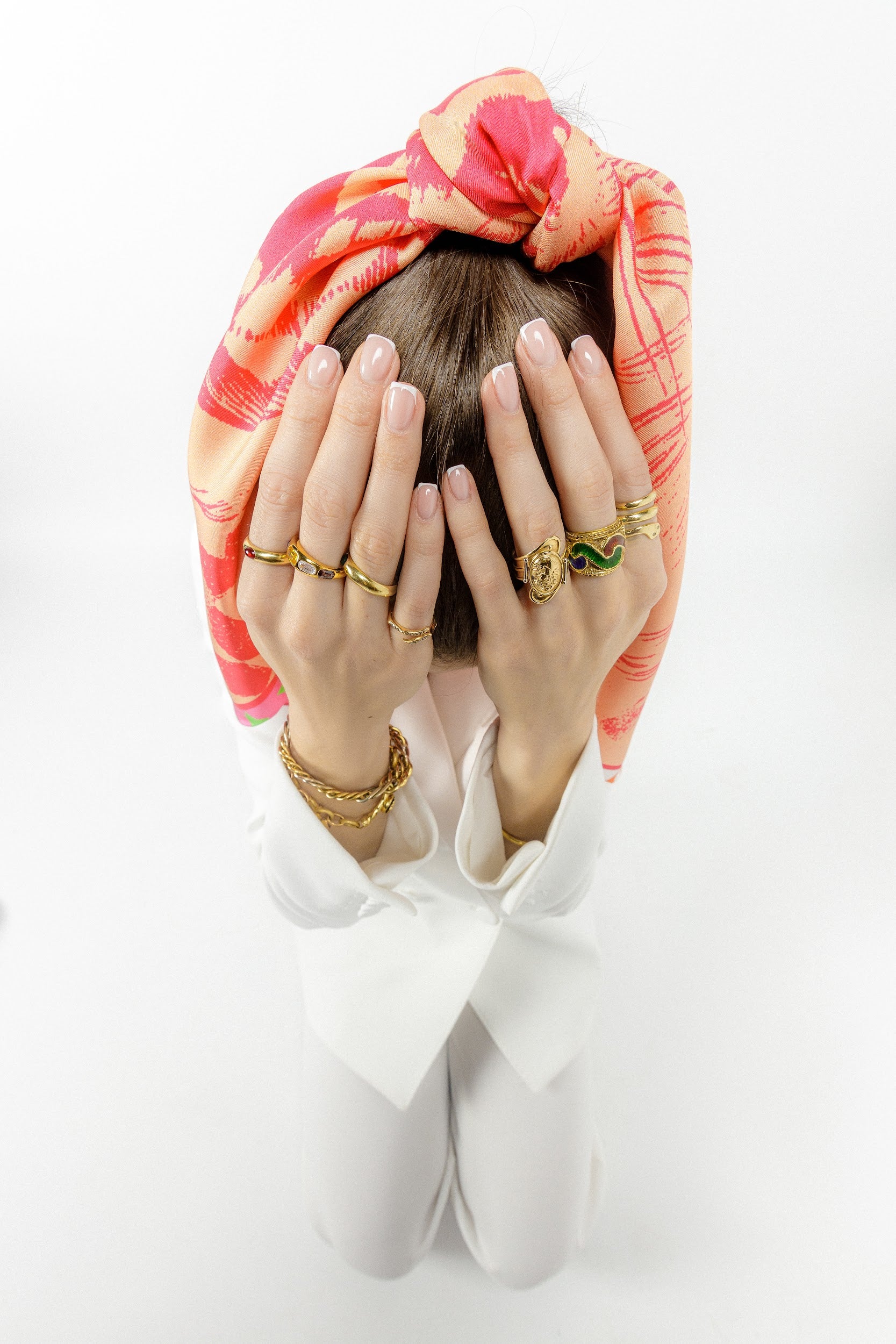 Model wearing silk square scarf on her ponytail