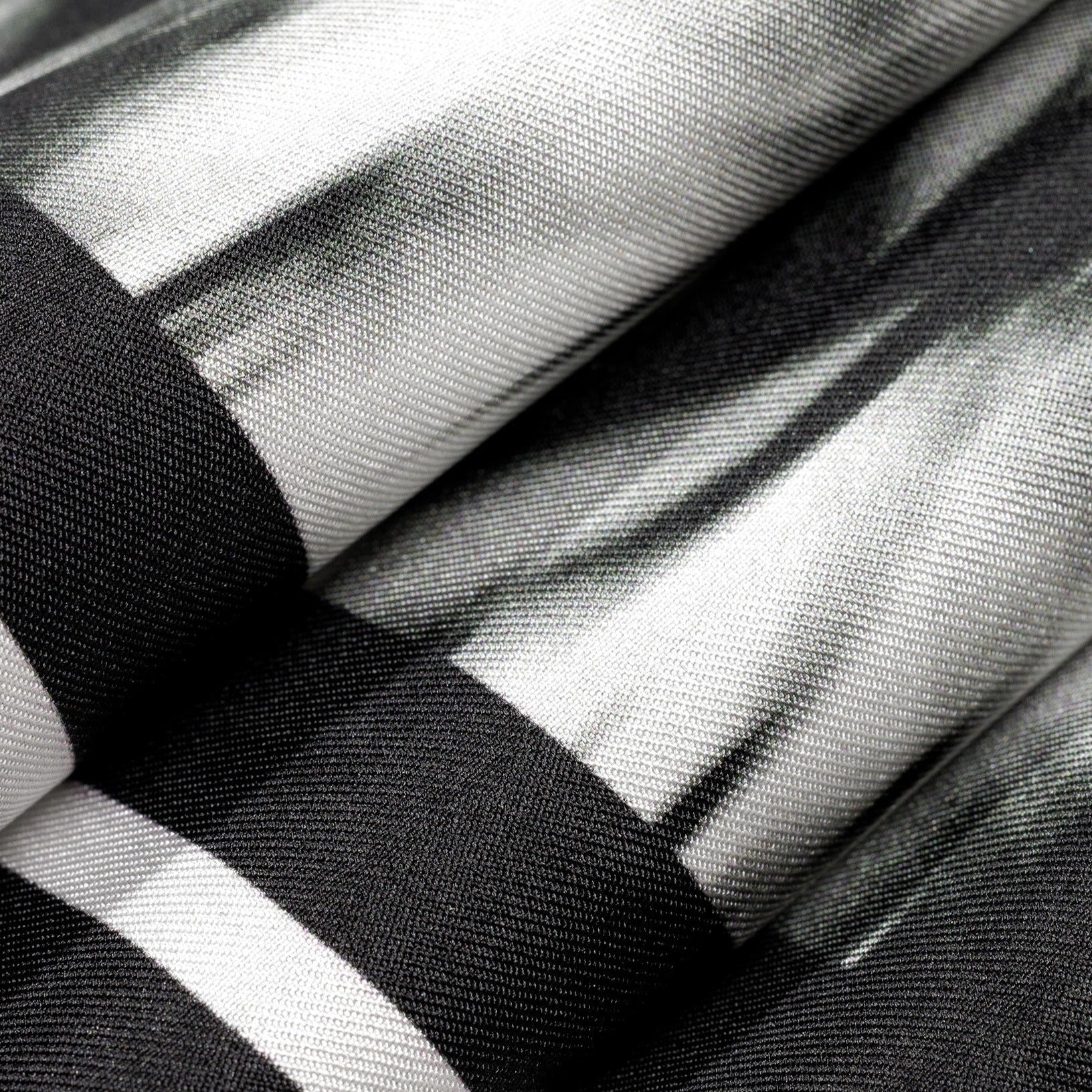 zoom on silk twill fabric with black and white print