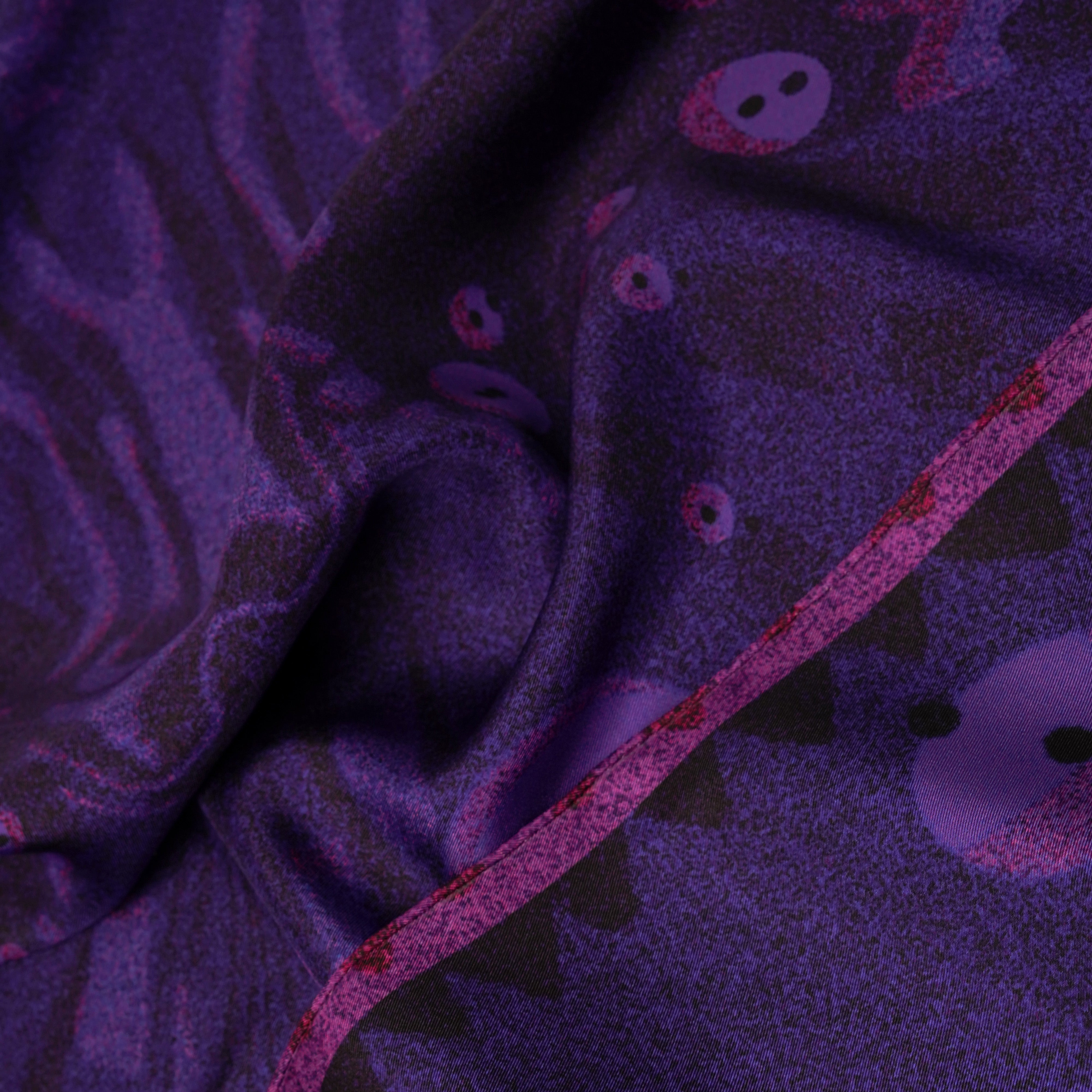 zoom on silk twill fabric with purple and pink print