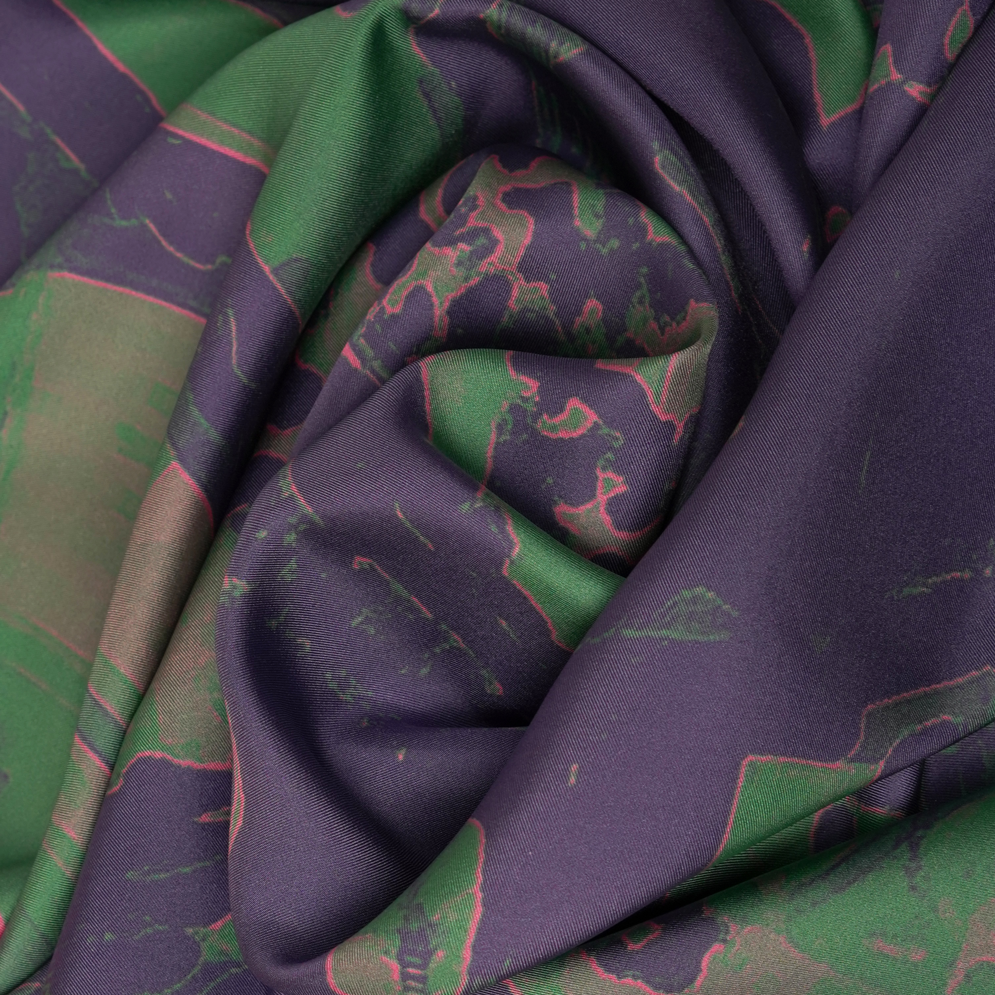 zoom on silk twill fabric in purple green and pink print