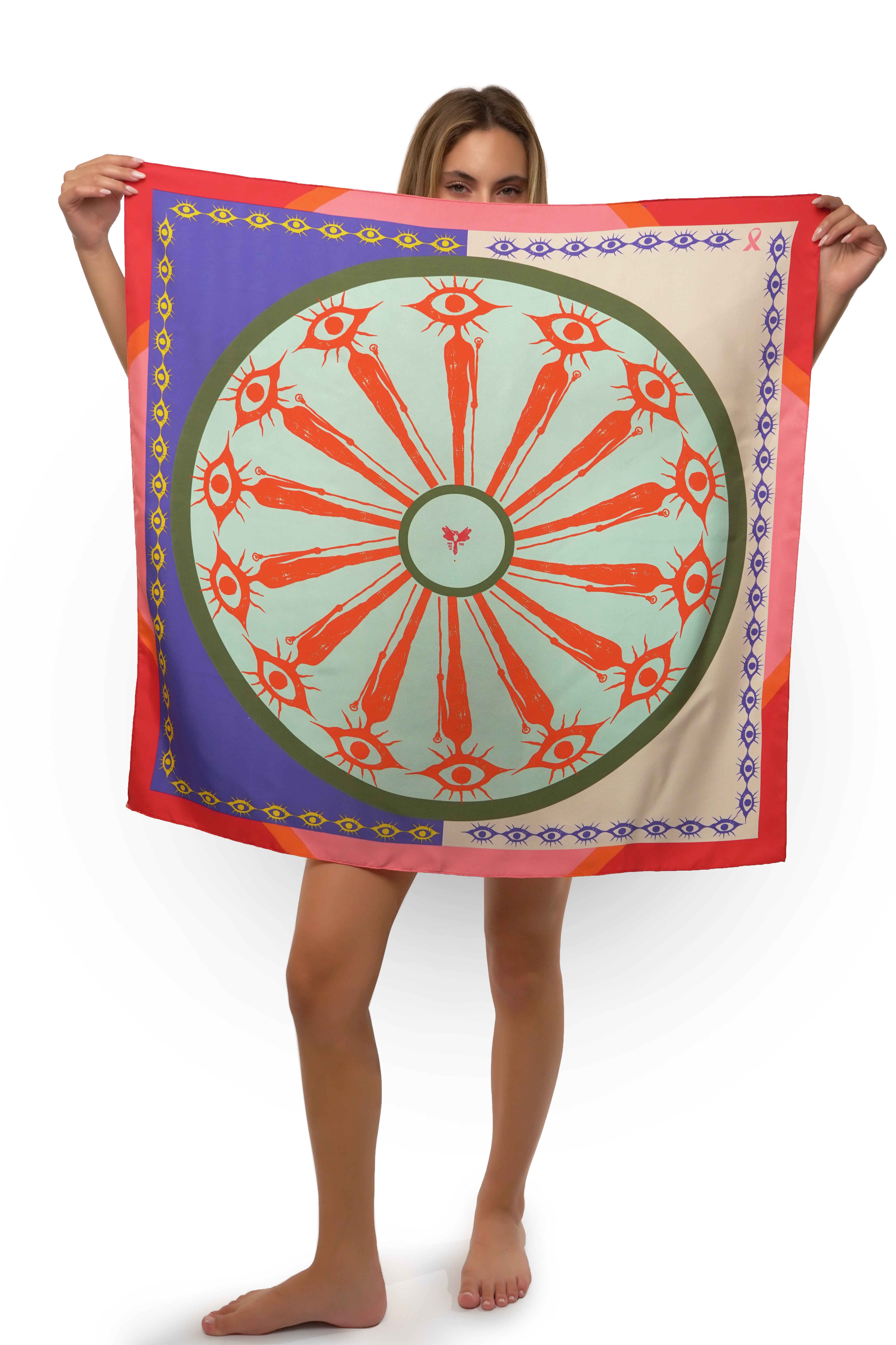 model holding silk twill square scarf with eye multicolor print