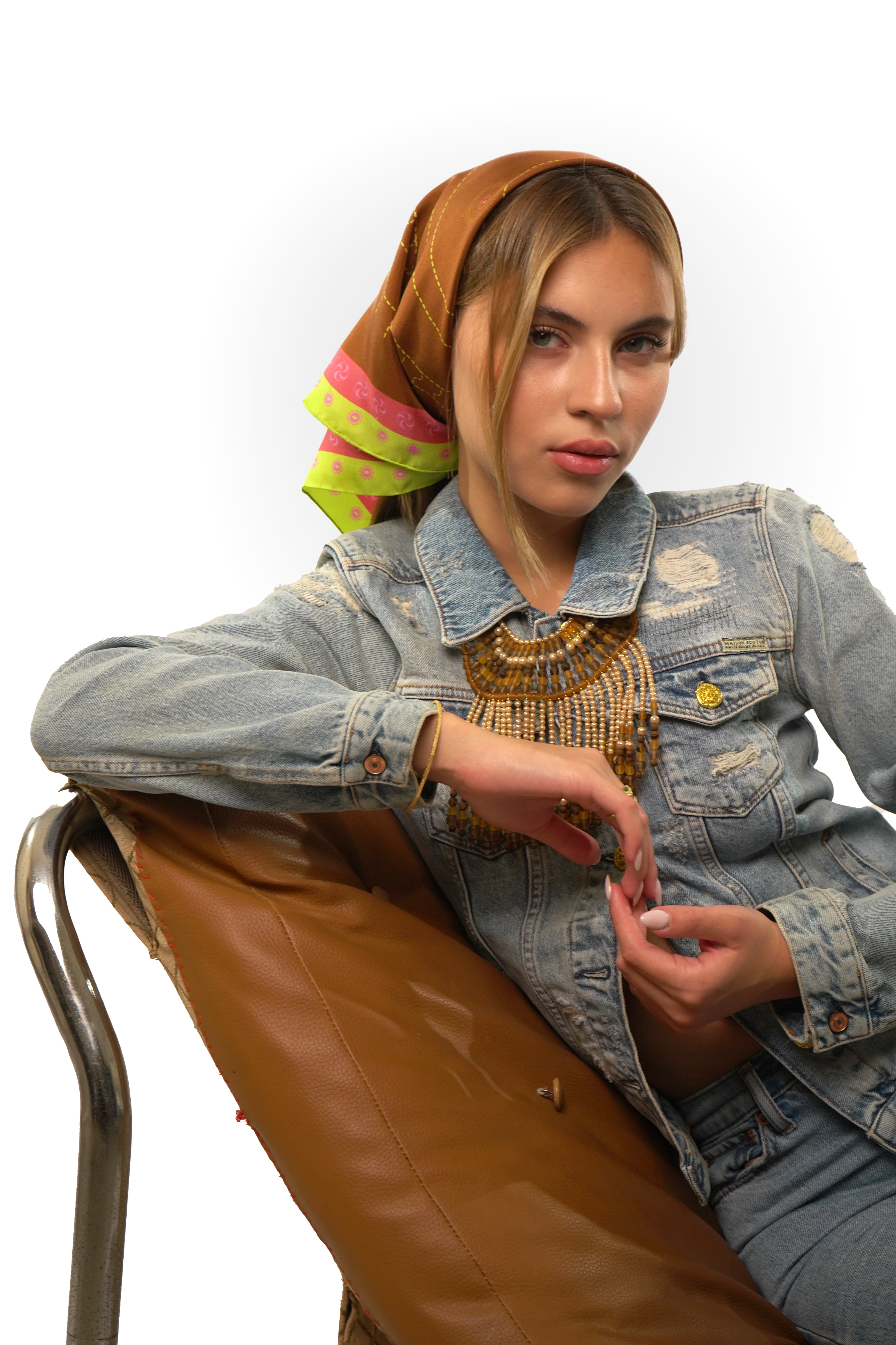 model wearing silk square scarf on her head