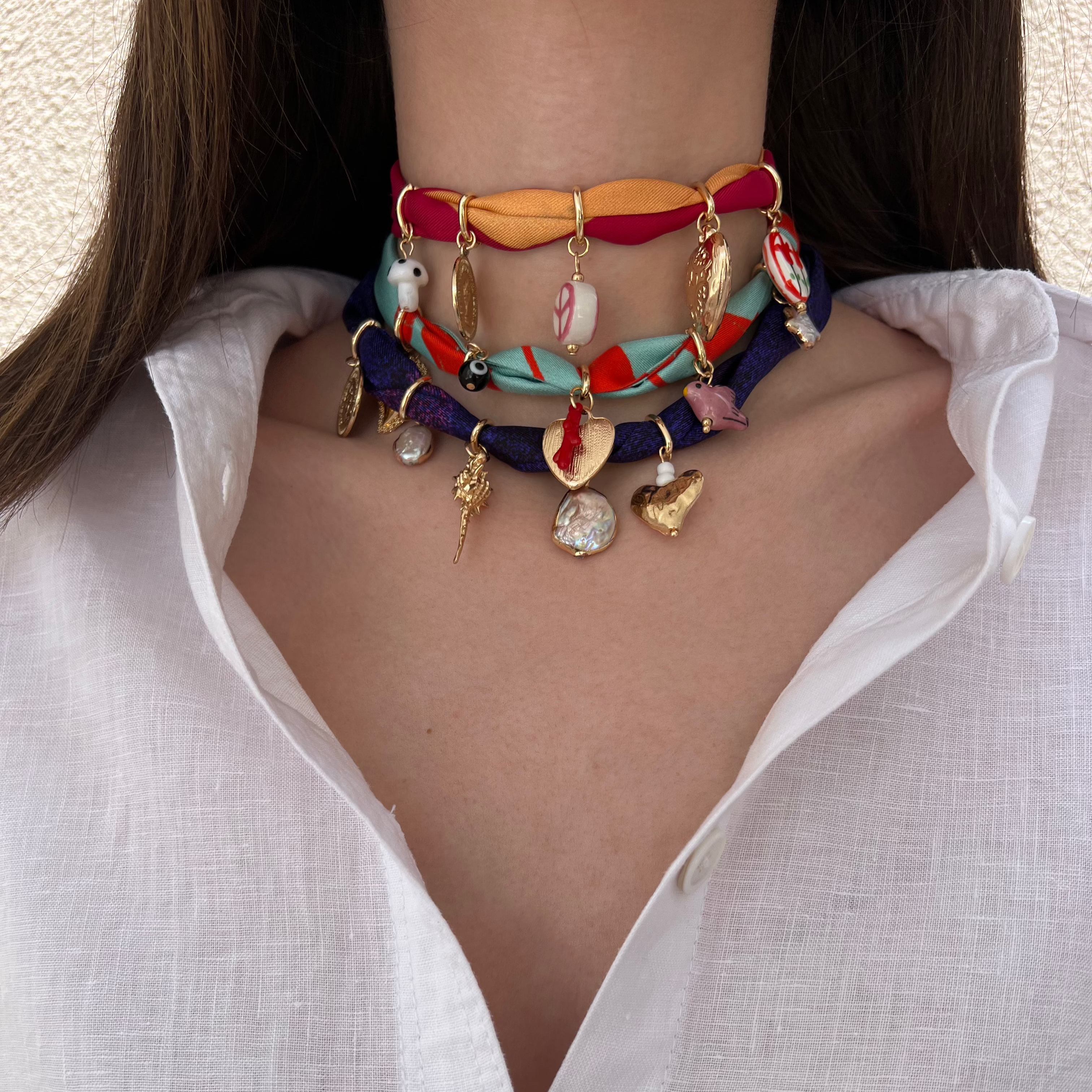 silk fabric necklaces with charms in three different models