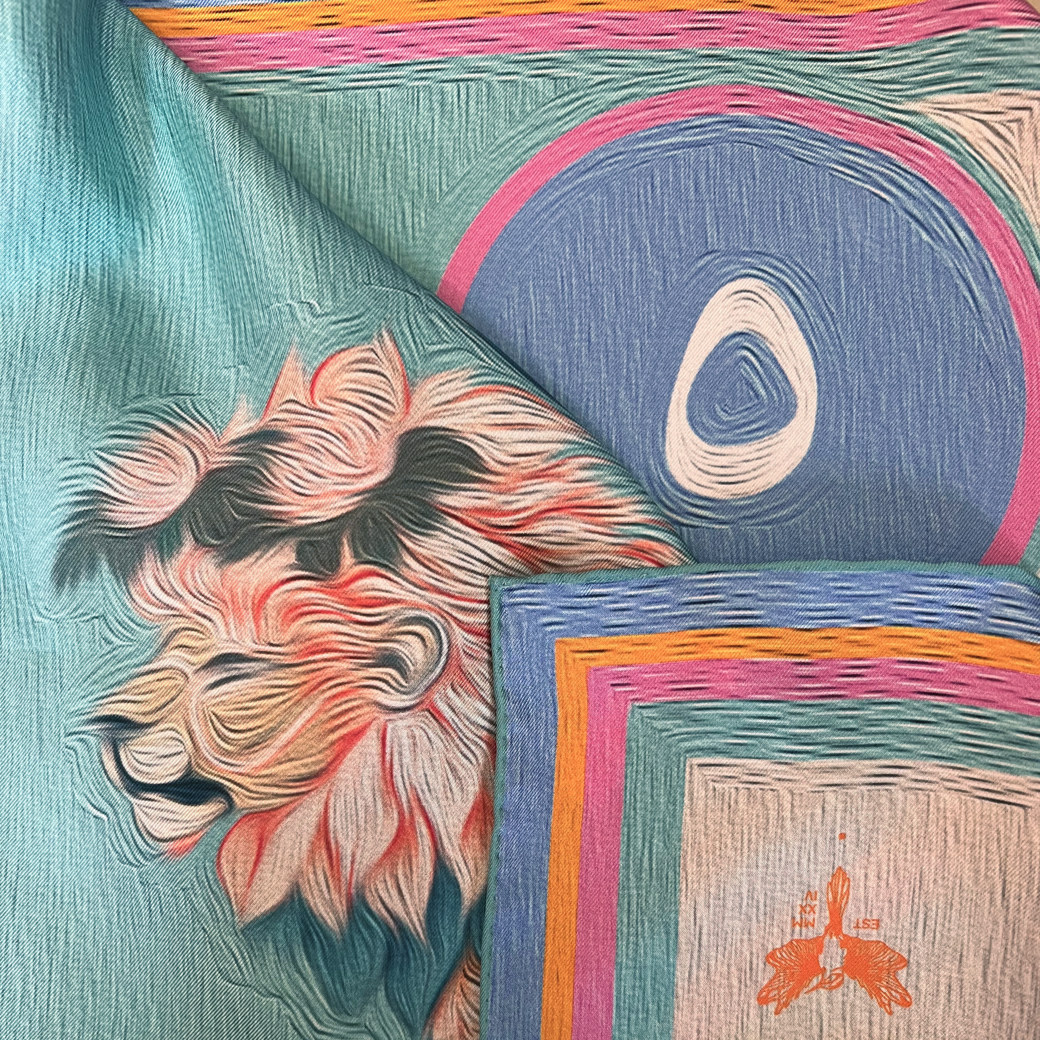 zoom on silk twill fabric with leo astrology design