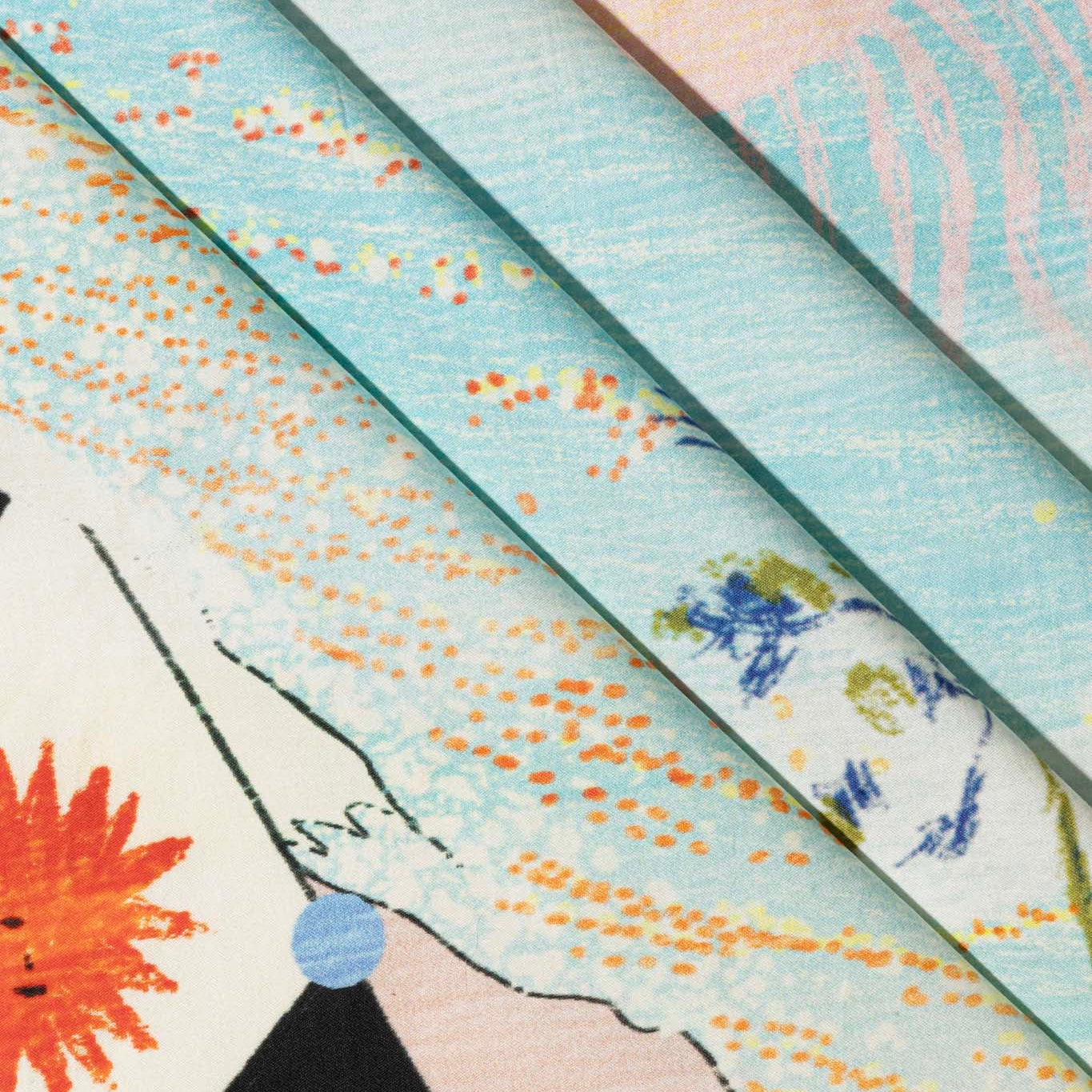 Close-up of cotton scarf with sea and beach design