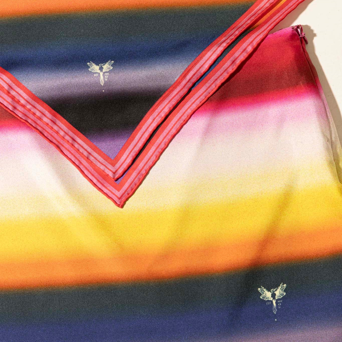 Colorful striped rainbow silk scarf with matching skirt with a small logo hummingbird design 
