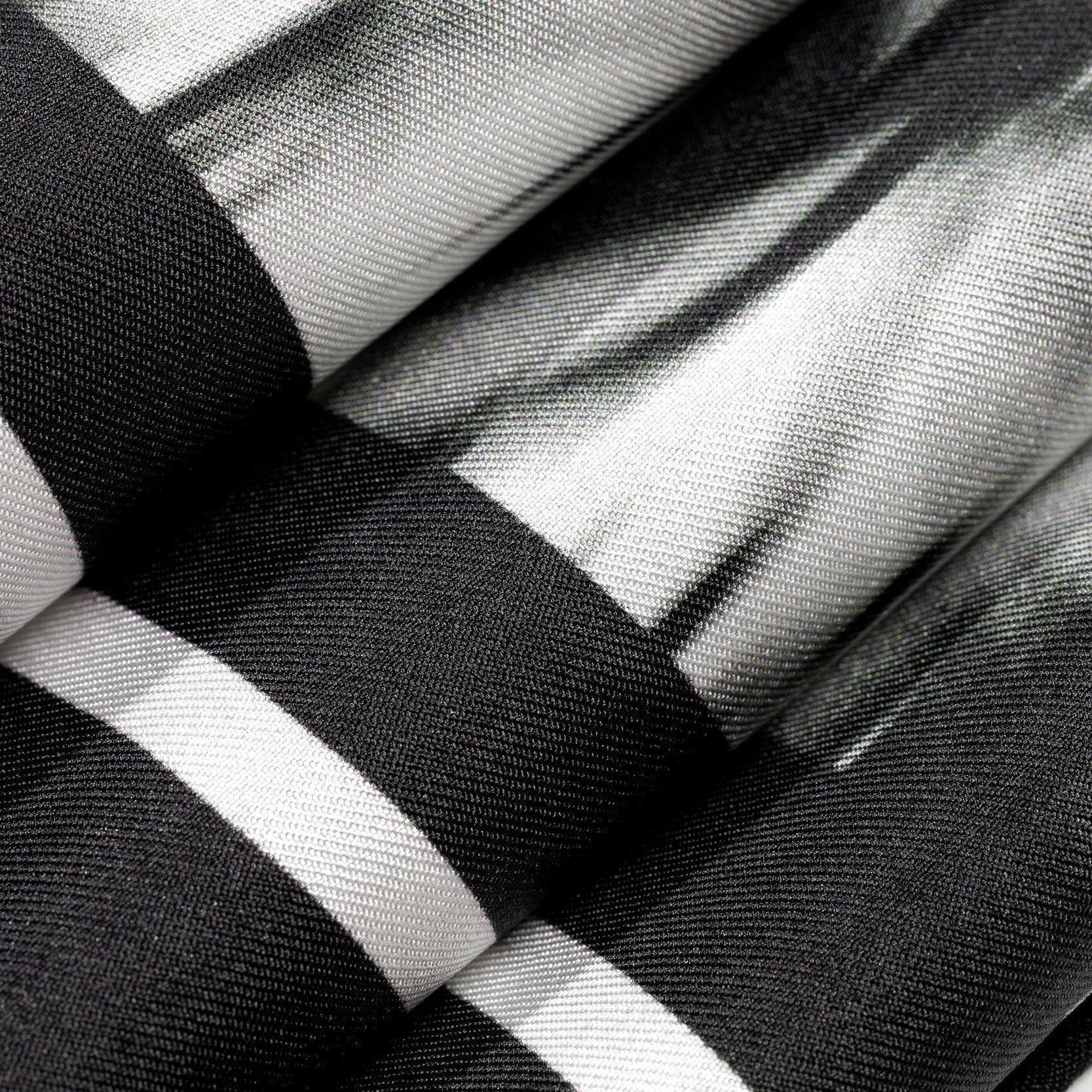 Close-up of black and white silk twill scarf 