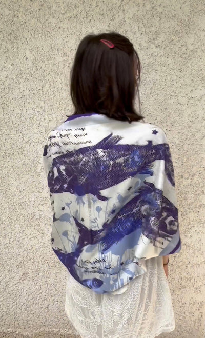 Tutorial video how to style silk twill square scarf as a cape