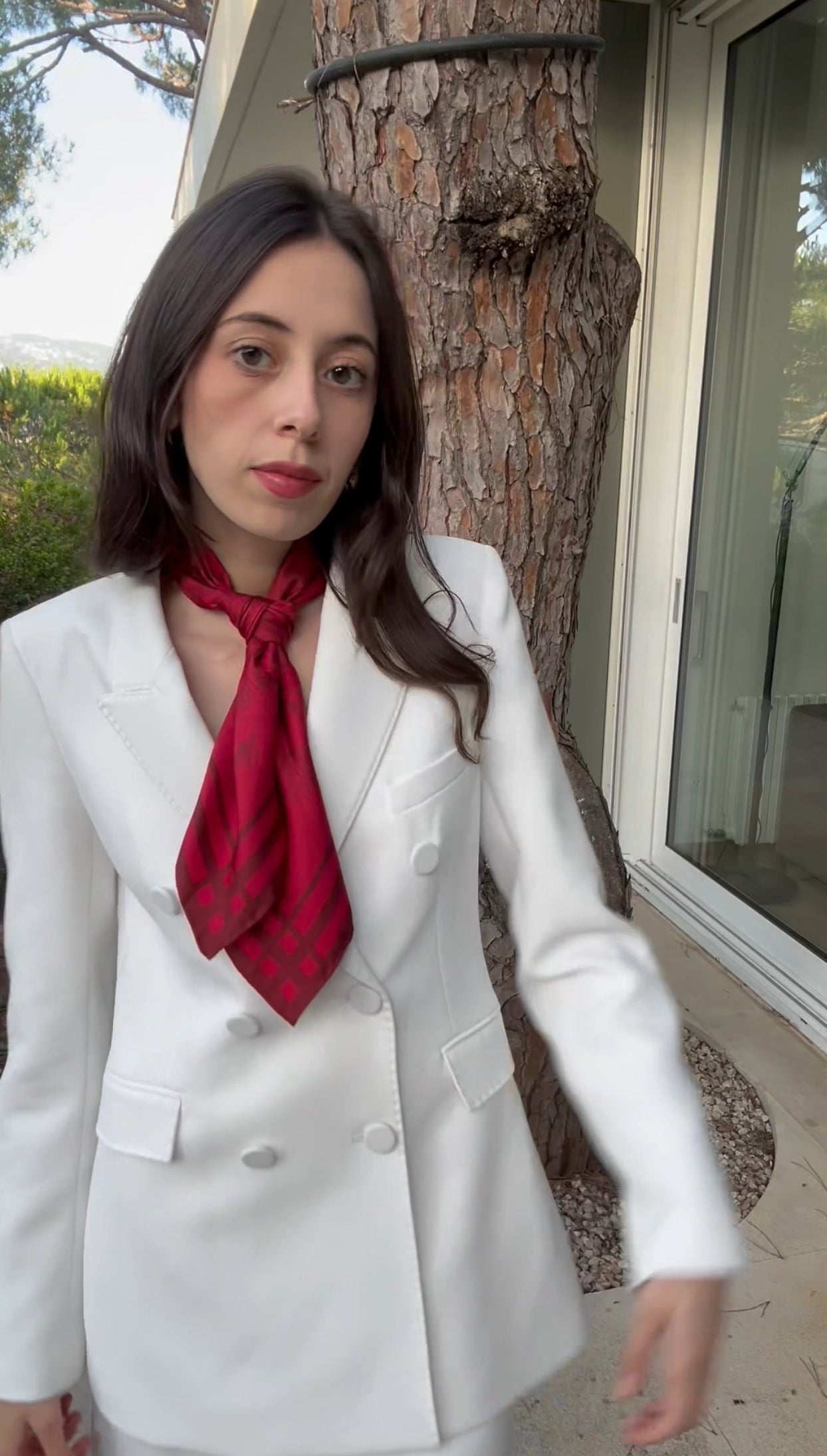 Tutorial video how to style a silk twill square scarf as a neck tie